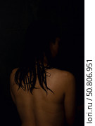 Silhouette of a Woman Gracefully Posed in a Beautifully Dimly Lit Setting with Depth. Стоковое фото, фотограф Аксенова Вера / Фотобанк Лори