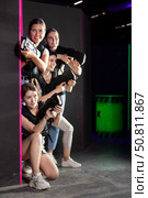 Together girls wait for enemy, effect of surprise, competitions, struggle of laser weapons. Стоковое фото, фотограф Яков Филимонов / Фотобанк Лори