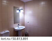 Modern Bathroom Sink with Mirror and Light Fixture. Стоковое фото, фотограф Дмитрий Брусков / Фотобанк Лори
