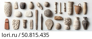Assortment of Artifacts: An archeological presentation of ancient pottery, stone carvings, and tools against a clean white surface. Стоковое AI-изображение, AI-художник Данила Большаков / Фотобанк Лори