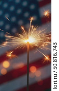 Sparklers and american Flag. Independence day USA . Celebration 4th of July - Patriotic Holiday. Стоковое AI-видео, аниматор Sergey Grishin / Фотобанк Лори