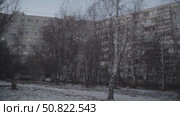 Faceless Soviet-Era Building in Grey Winter Light. Стоковое видео, видеограф Поскребышев Михаил / Фотобанк Лори