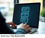 Online assessment and survey concept. A person interacts with virtual checklist on laptop, symbolizing online assessments, surveys, exams, or quizzes. digital evaluation and data collection. Стоковое AI-изображение, AI-художник Sergey Grishin / Фотобанк Лори