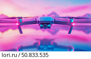 Modern technological equipment: A Quadcopter Drone hovering with a bright vivid colored sunrise. Стоковое AI-изображение, AI-художник Данила Большаков / Фотобанк Лори