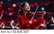 Harmonic Serenade: A poised musician in red attire plays violin, immersed in symphony, her face radiates passion. Стоковое AI-изображение, AI-художник Данила Большаков / Фотобанк Лори