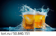 Cheers!: Golden Beverage Collision with Aqua Splash, Refreshing Drink for Celebration, Party, Bar Promotion. Стоковое AI-изображение, AI-художник Данила Большаков / Фотобанк Лори