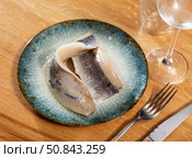 Pieces of pickled herring served on platter. Стоковое фото, фотограф Яков Филимонов / Фотобанк Лори