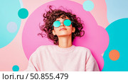 Summer daydream: Woman in mint shades on playful geometric. Стоковое AI-изображение, AI-художник Данила Большаков / Фотобанк Лори