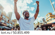 Triumphant Celebration: A Man's Joyful Success Moment in a Bustling Cityscape, Design for motivational poster or a victory announcement. Стоковое AI-изображение, AI-художник Данила Большаков / Фотобанк Лори