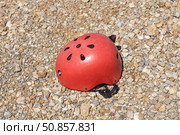 A red helmet on the orange and yellow stones background. Стоковое фото, фотограф Татьяна Куклина / Фотобанк Лори