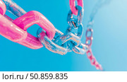 Vibrant Interlocked: Colorful Chain Link Network in Pink and Blue against a Sky Blue Backdrop. Стоковое AI-изображение, AI-художник Данила Большаков / Фотобанк Лори