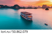 Luxury Cruise Through Halong Bay: A Journey into Serenity at Twilight. Стоковое AI-изображение, AI-художник Данила Большаков / Фотобанк Лори
