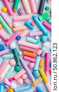 Pastel Palette: An Assortment of Soft-Hued Chalks and Candies, a Playful Still Life Composition. Стоковое AI-изображение, AI-художник Данила Большаков / Фотобанк Лори