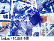 Dollar bills, black lock and metal chain. Money lock or security concept. Account lockout. Стоковое фото, фотограф Емельянов Евгений Викторович / Фотобанк Лори