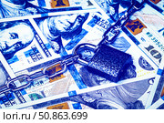Dollar bills, black lock and metal chain. Money lock or security concept. Account lockout. Стоковое фото, фотограф Емельянов Евгений Викторович / Фотобанк Лори