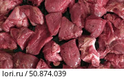 Raw sliced pork in sauce. Pieces of fresh marinated pork medallions. Freshly meat tenderloin, perfect for culinary, home cooked meals and flavor. Chopped Pork ham fillet with spice, herbs. 4K video. Стоковое видео, видеограф Марина Демидюк / Фотобанк Лори