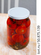 Pickled tomatoes in glass jar. Стоковое фото, фотограф Яков Филимонов / Фотобанк Лори