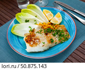 Delicious fried cod fillet with endive, corn, and greens. Стоковое фото, фотограф Яков Филимонов / Фотобанк Лори