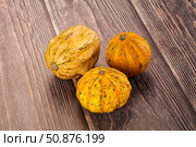 Decorative yelow pampkin seasonal vegetables. Стоковое фото, фотограф Андрей Старостин / Фотобанк Лори