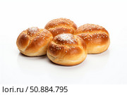 Kaiser rolls sprinkled with sesame seeds resting on white background. Стоковое AI-изображение, AI-художник Иван Рябоконь / Фотобанк Лори