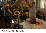 Foundry - ferrous metal is melted in an induction furnace of metallurgical plant. Стоковое фото, фотограф Татьяна Яцевич / Фотобанк Лори