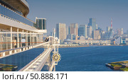 Tokyo, Japan - Oct 13 2024, panoramic view of the skyscrapers of the city and Tokyo Bay from the deck of the MSC Bellissima cruise ship, at daytime, Tokyo, Japan. Редакционное фото, фотограф Сергей Богомяко / Фотобанк Лори