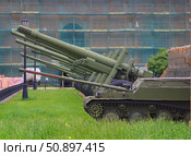 Soviet artillery 30-60 years of the 20th century the facade of the Peter and Paul fortress in Saint-Petersburg. Crownwork. In the foreground light airborne self-propelled gun. Редакционное фото, фотограф Константин Тимофеев / Фотобанк Лори
