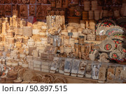 Handicrafts made of birch bark and wood. Souvenir thematic products on shelves of city market in Viborg. Редакционное фото, фотограф Мария Паина / Фотобанк Лори