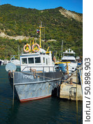 Utrish, Russia - September 07, 2022: Port and parking for yachts and ships. Редакционное фото, фотограф Наталия Кирсанова / Фотобанк Лори