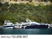 Utrish, Russia - September 07, 2022: Port and parking for yachts and ships. Редакционное фото, фотограф Наталия Кирсанова / Фотобанк Лори
