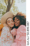 Uplifting and serene portrayal of two companions sharing a tender embrace under glowing natural light, evoking feelings of love and sincere friendship. Стоковое AI-видео, аниматор Данила Большаков / Фотобанк Лори