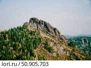 Landscape of Siberia mountains Stolbi, rock peak Takmak range in haze summer. Стоковое фото, фотограф Spirit River / Фотобанк Лори