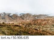 Landscape of Dagestan mountains, mountain range in haze summer Russia. Стоковое фото, фотограф Spirit River / Фотобанк Лори