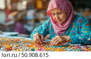 Portrait of a woman creating beaded jewelry. Стоковое AI-изображение, AI-художник Данила Большаков / Фотобанк Лори