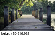 pier dock wood ai generated. Стоковое AI-изображение, AI-художник Vectorwin / Фотобанк Лори