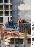 Construction site with formwork and rebar for a concrete building structure. Стоковое фото, фотограф Данила Большаков / Фотобанк Лори