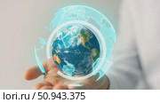 Human hand holding a holographic digital Earth model. Стоковое AI-видео, аниматор Екатерина Усенко / Фотобанк Лори