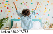 An optimistic individual celebrating a successful morning, joyfully raising their arms to express elation and accomplishment, a portrait of pure happiness and cheerful disposition. Стоковое AI-изображение, AI-художник Данила Большаков / Фотобанк Лори