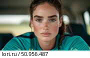 Candid frontal portrait of a natural woman with striking green eyes and freckled skin, showcasing authentic human connection and beauty. Стоковое AI-изображение, AI-художник Данила Большаков / Фотобанк Лори