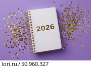 Empty notebook 2026. Purple color background. Blank Greeting Card, Invitation. Minimal Flier Design. Back to life, goal list concept. Resolutions, plan, goals, checklist idea. Top view. New Year. Стоковое AI-изображение, AI-художник Марина Демидюк / Фотобанк Лори