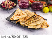 Indian stuffed potato bread Paratha. Стоковое фото, фотограф Андрей Старостин / Фотобанк Лори