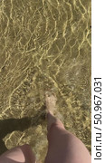Women's long legs walk on the sand and enter the clear water of the sea, pov. Стоковое видео, видеограф Кашапова Эльвира / Фотобанк Лори