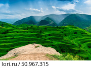 Rocky ledge of the observation point with an incredibly beautiful view of the green terraced mountains. North Caucasus. Стоковое фото, фотограф Константин Лабунский / Фотобанк Лори