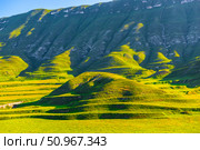 Incredibly beautiful view of the ancient green slope of the mountain plateau with erosion and natural terraces of geological deposits. North Caucasus. Стоковое фото, фотограф Константин Лабунский / Фотобанк Лори