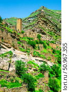 An old watchtower among the ruins of the abandoned mountain village of Kakhib on a mountainside. North Caucasus (2024 год). Стоковое фото, фотограф Константин Лабунский / Фотобанк Лори