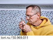 Coupling for compression fitting provides easy dismantling joint suitable for multilayer pipe connections in plumbing systems. Стоковое фото, фотограф Владимир Григорьев / Фотобанк Лори