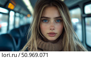 Captivating portrait of a young woman with piercing blue eyes and freckles, looking directly at the viewer from inside a blurred vehicle. Стоковое AI-изображение, AI-художник Данила Большаков / Фотобанк Лори