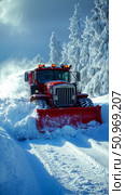 A powerful red snowplow efficiently clears a path through deep, pristine white snow on a bright, sunny winter day, surrounded by majestic, snow-laden evergreen trees under a clear blue sky. Стоковое AI-изображение, AI-художник Данила Большаков / Фотобанк Лори