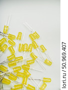 Yellow LED lamps. A scattering of electronic elements. Light-emitting diodes. Стоковое фото, фотограф Valeriy Lushchikov / Фотобанк Лори