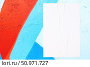 colorful urban wall texture with wrinkled glued poster template. Стоковое фото, фотограф Александра Конопля / Фотобанк Лори